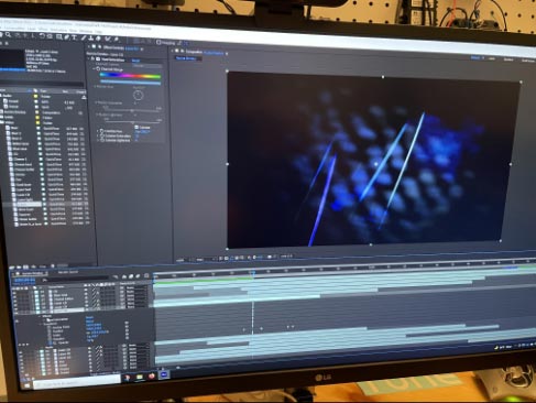 Video of abstract shapes of light were compiled in After Effects to create an aurora-like experience.